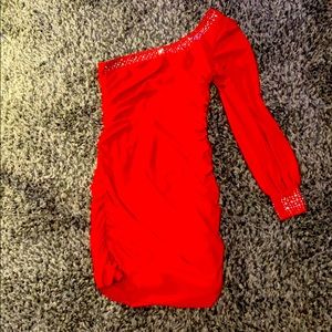 A tight red scrunch cook tail dress with gems !!